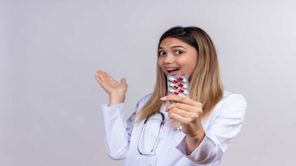 a girl is having tramadol medicine in her hand